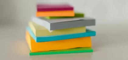 a deck of stick pad in different colors